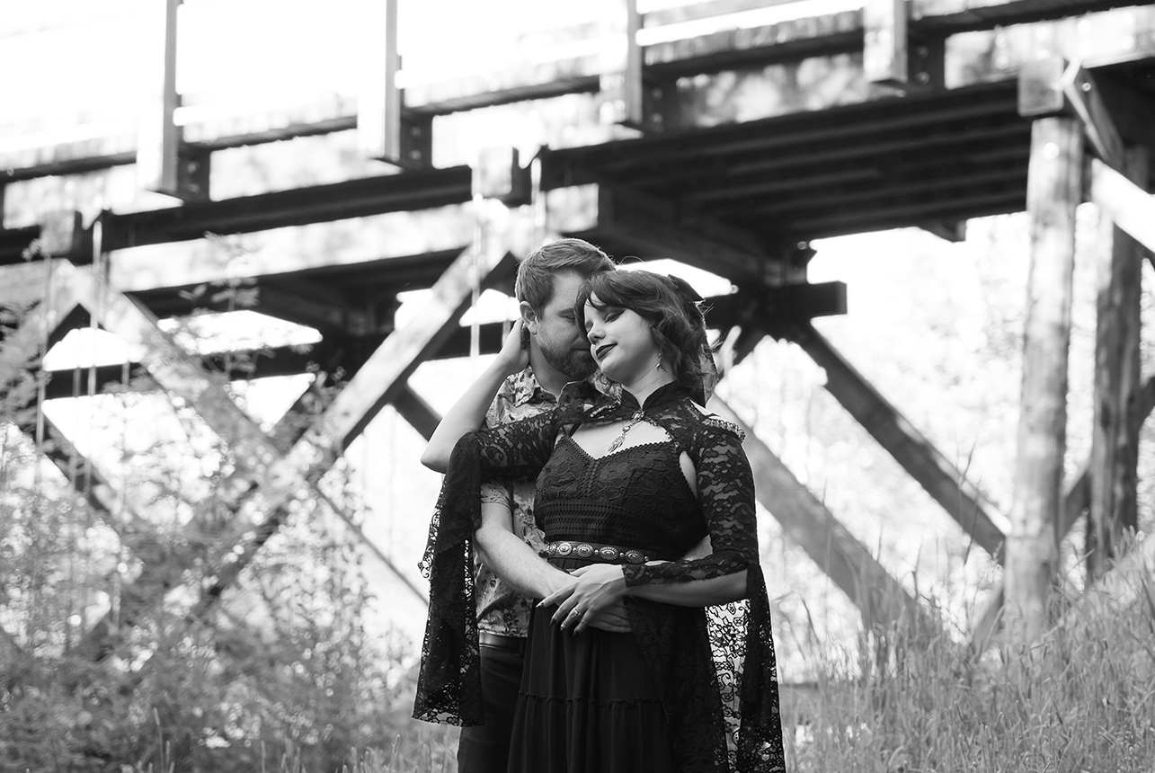 black-and-white-trestle-bridge-engagement-edmonton