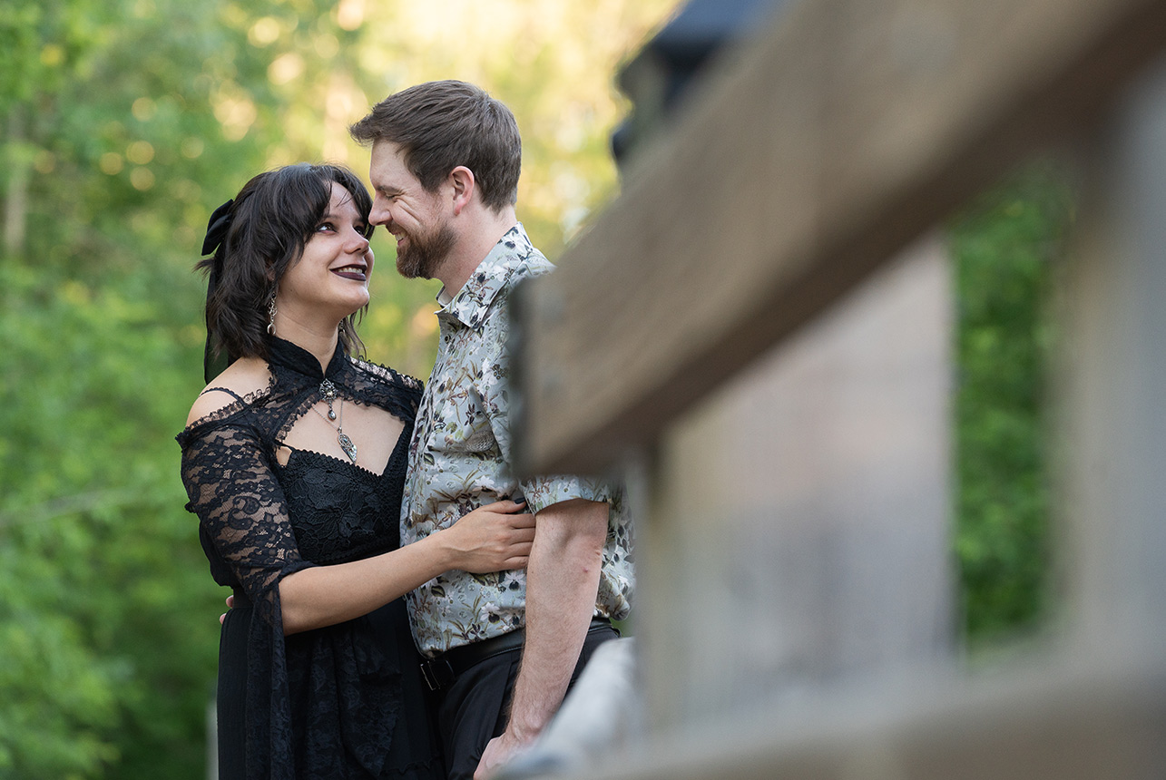 couple-smiling-mill-creek-bridge-edmonton