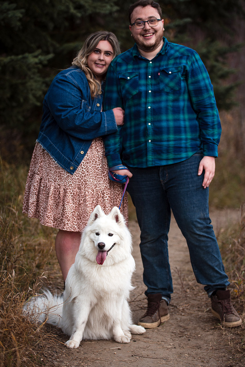 Couple candidly posing for an authentic shot, benefiting from excellent photographer direction