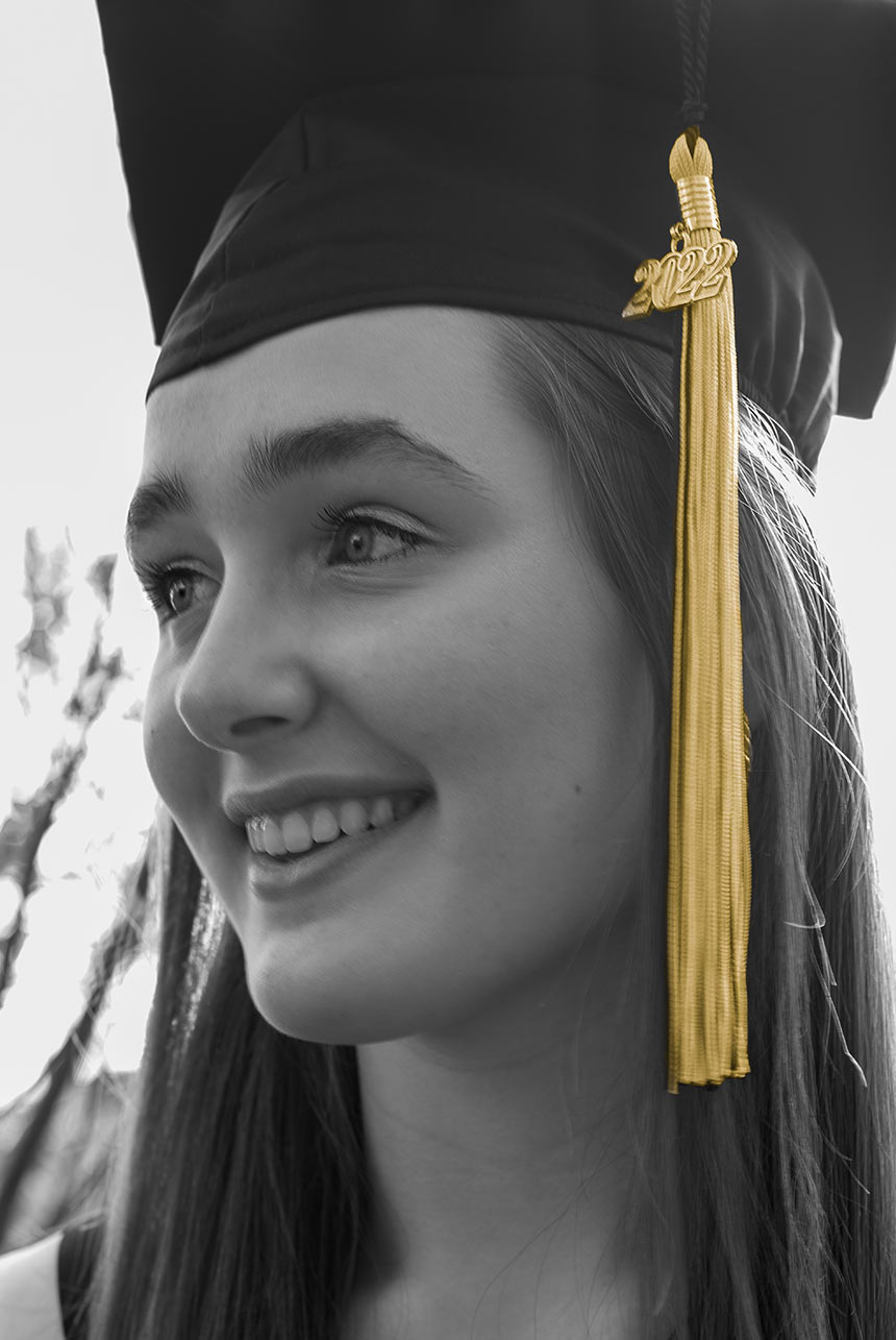 Beautiful Black and White Photo of Young Woman Graduate with Yellow Tassel