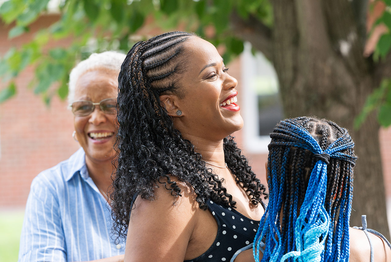 grandmother-laughing-smeltzer-house-sherwood-park Grandmother and daughter sharing a laugh at Smeltzer House
